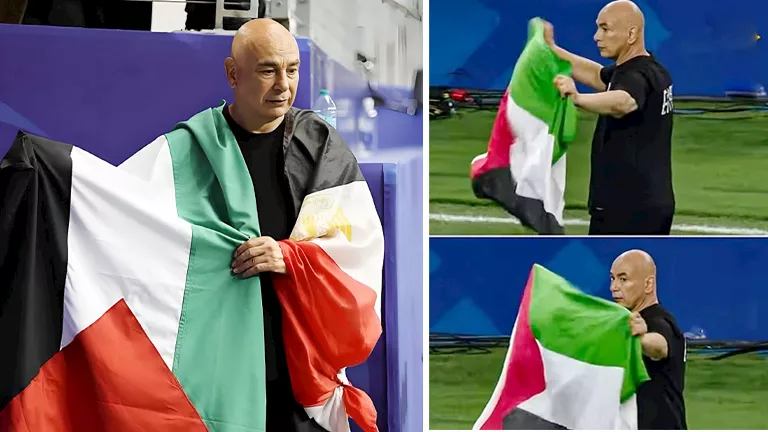 حسام حسن يحمل العلم الفلسطيني خلال مباراة مصر والأرجنتين بكأس العالم 2026