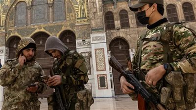 بالأسماء| مقاتلون أجانب في الجيش السوري.. ماذا يعني؟