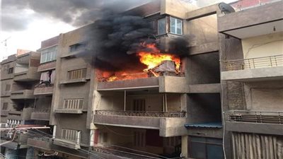 السيطرة على حريق عقار سكني بالدقي دون إصابات