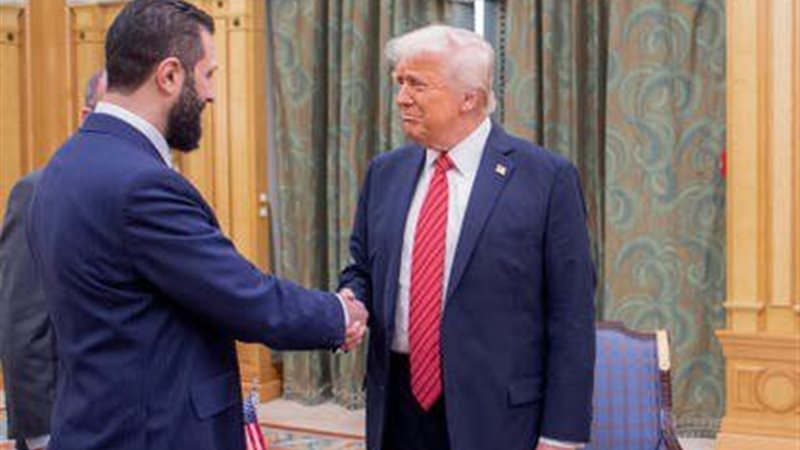 ترامب والشرع أثناء